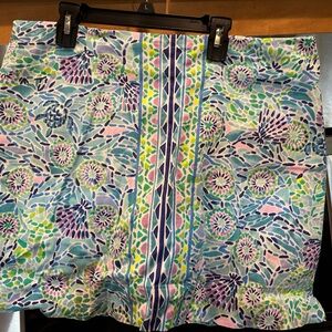 LIlly Pulitzer skort with back zip.   Has white linen shorts underneath.
